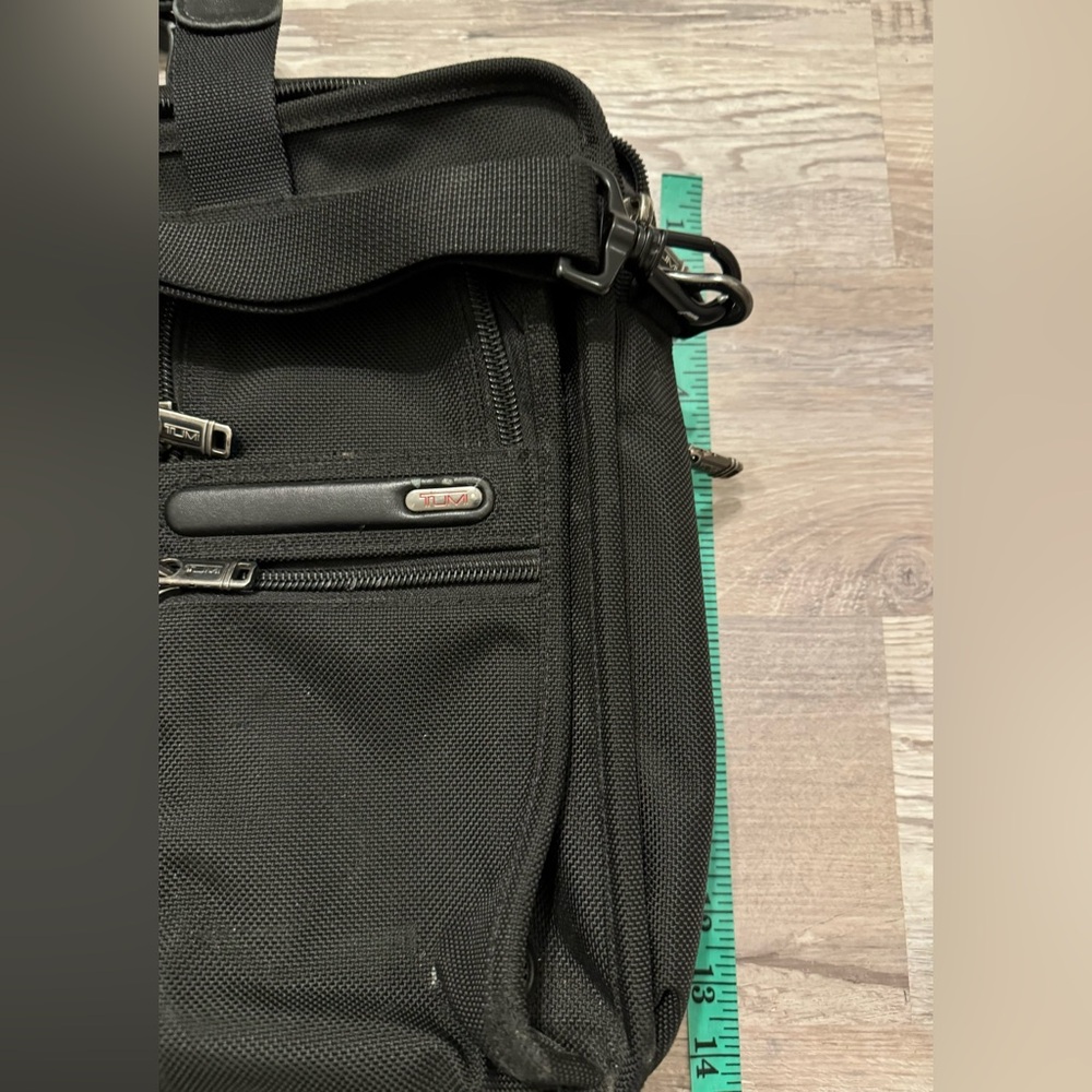 TUMI black laptop carrier bag. It has wallet inside.  It has various - Picture 8 of 15